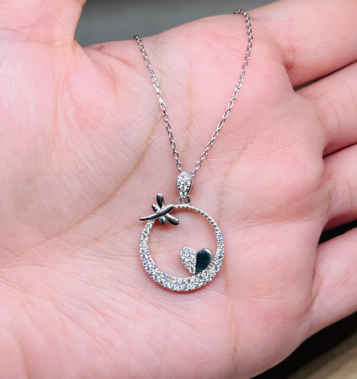 Circle necklace with butterfly and heart