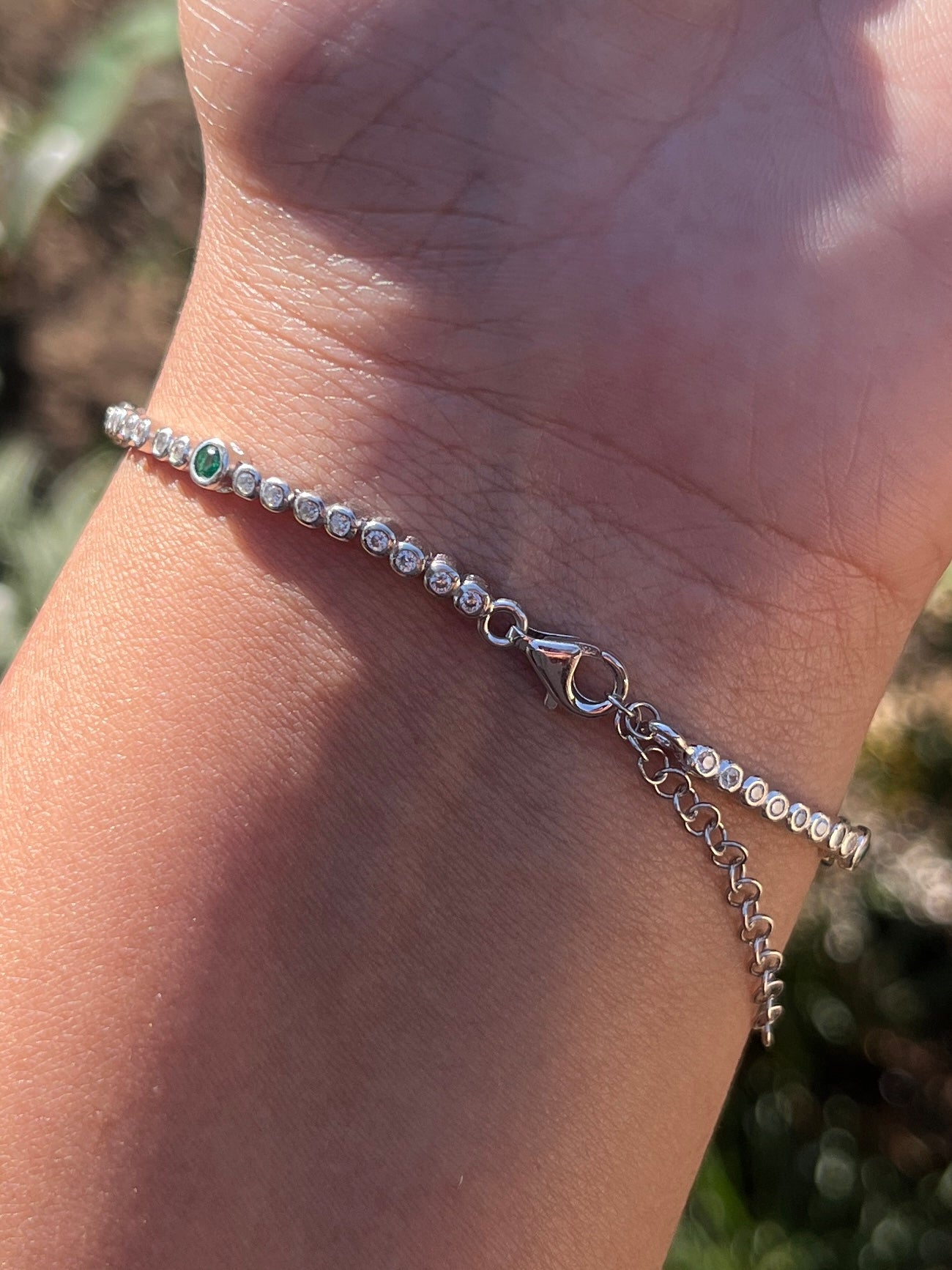 Round Tube Tennis Bracelet with a touch of green cz