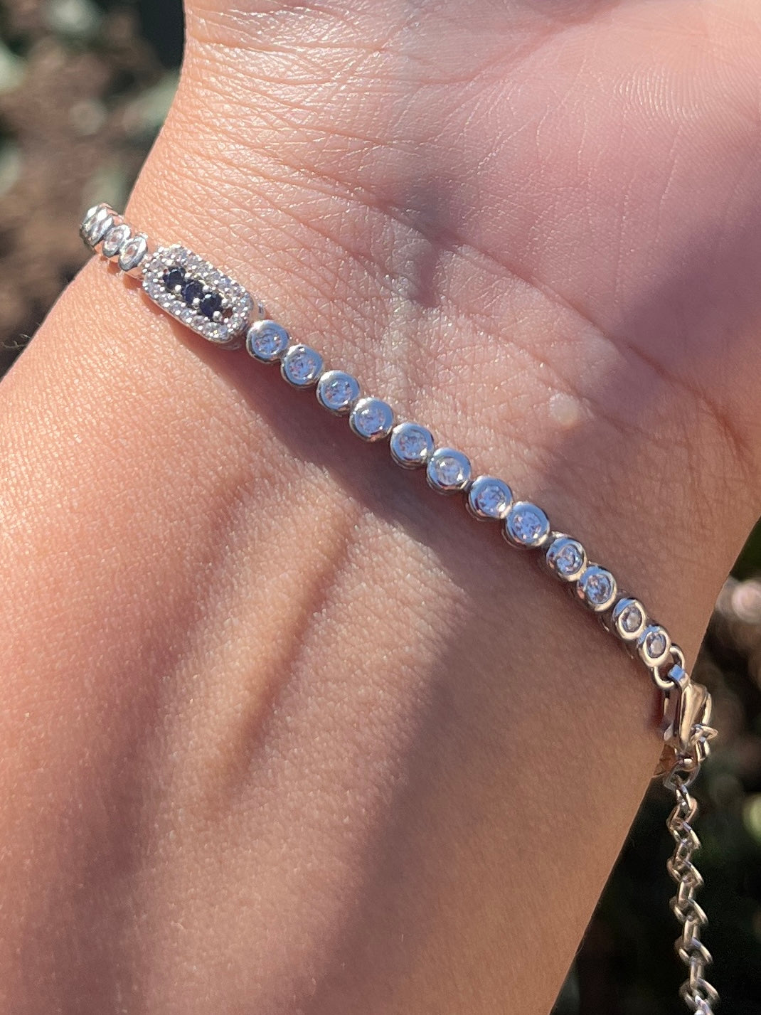 Tennis bracelet with rectangle design and royal blue cz stones