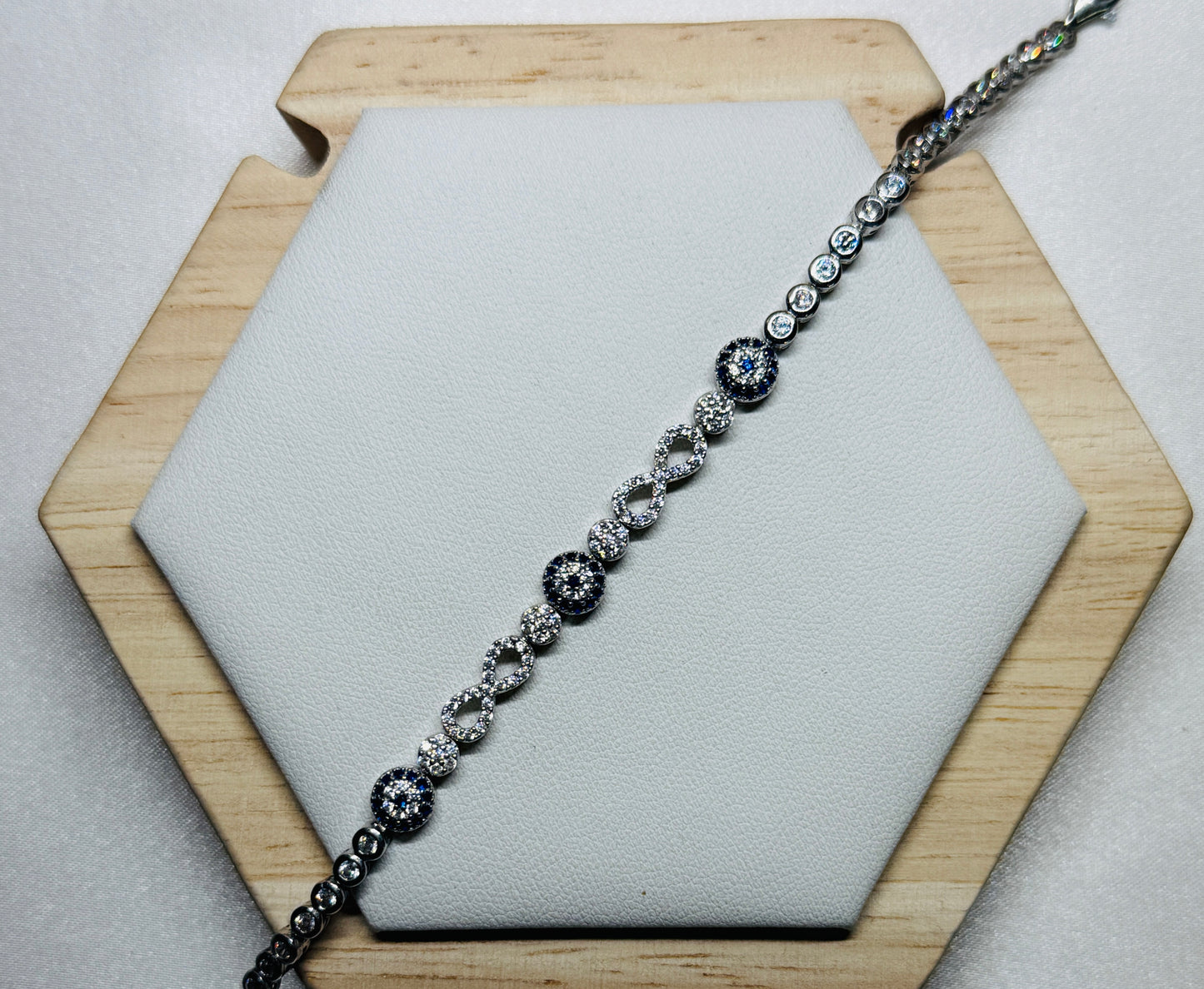 Evil eye tennis bracelet - with infinity design