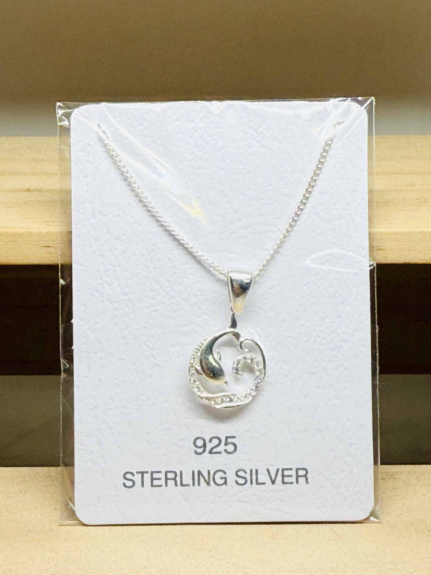 Dolphin in waves necklace