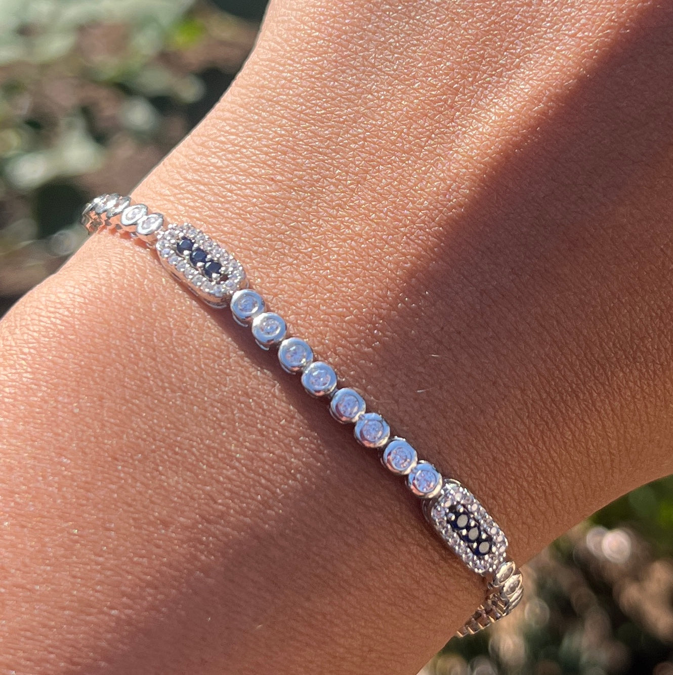 Tennis bracelet with rectangle design and royal blue cz stones