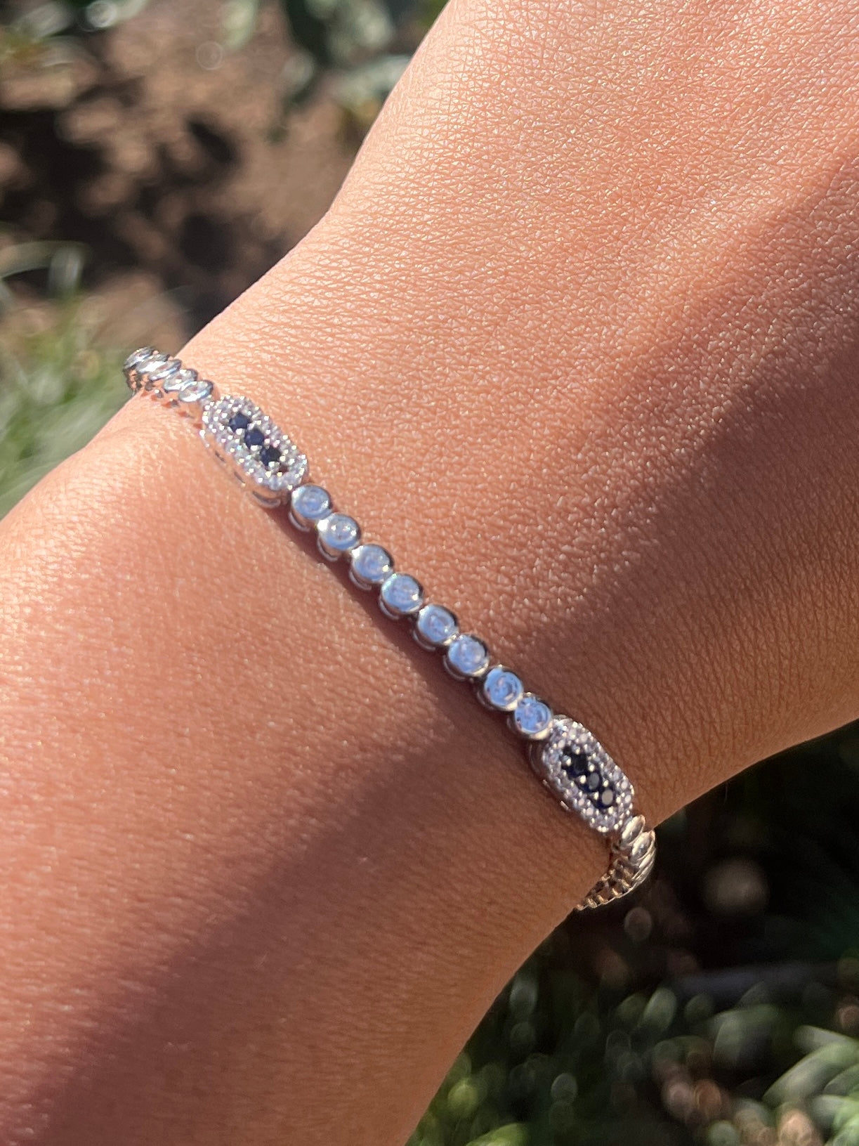 Tennis bracelet with rectangle design and royal blue cz stones