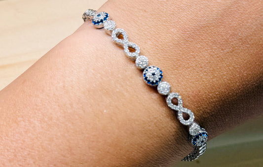 Evil eye tennis bracelet - with infinity design