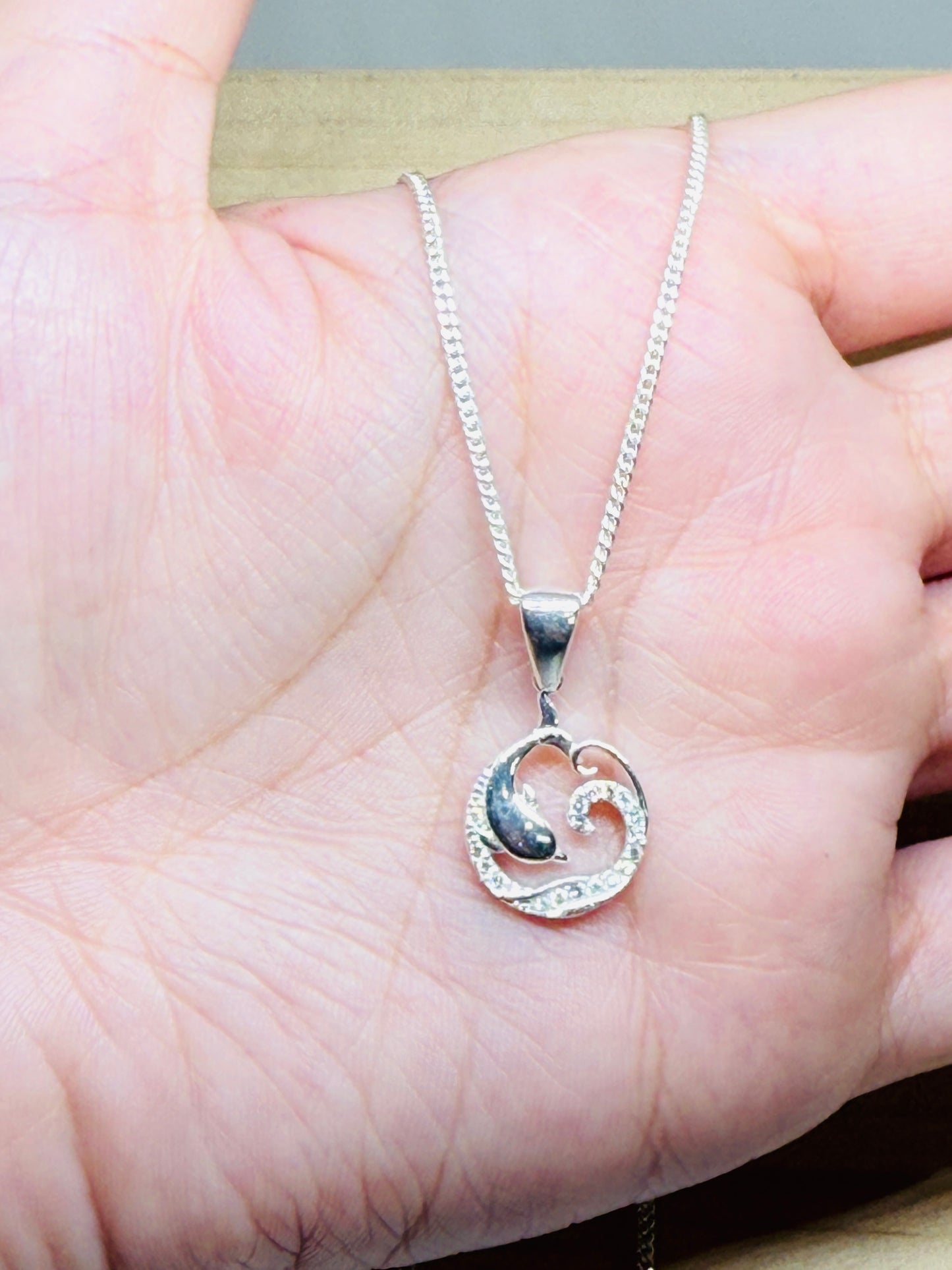 Dolphin in waves necklace