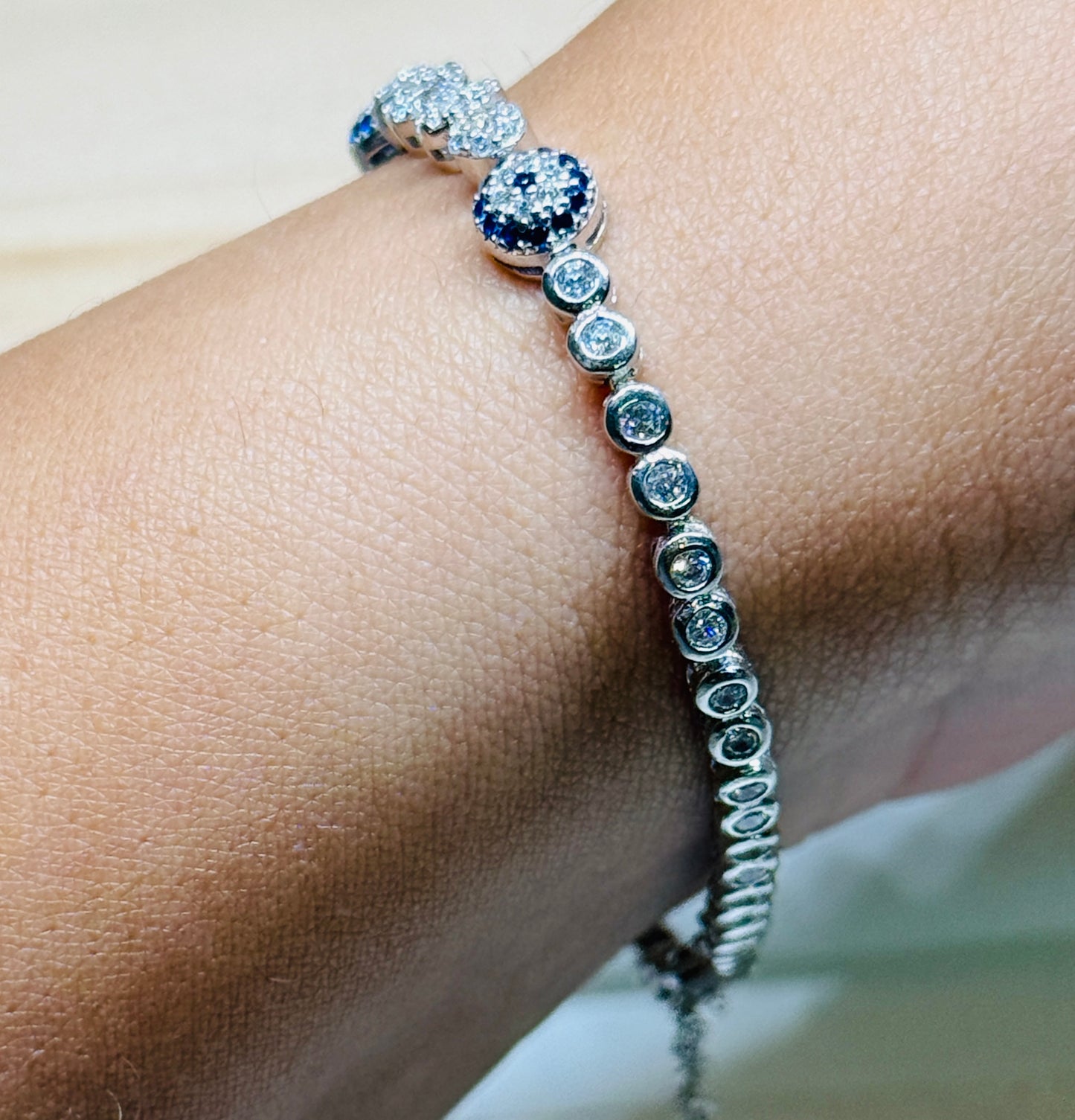 Evil eye tennis bracelet - with infinity design