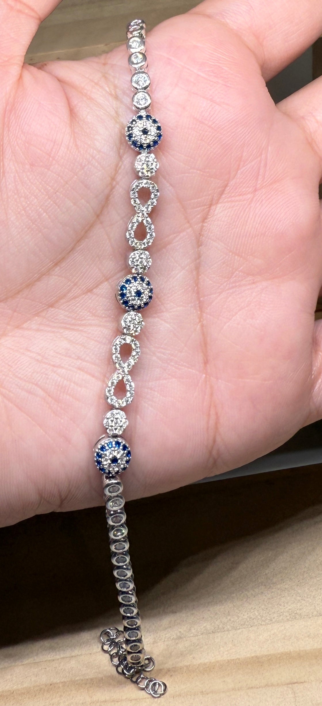 Evil eye tennis bracelet - with infinity design