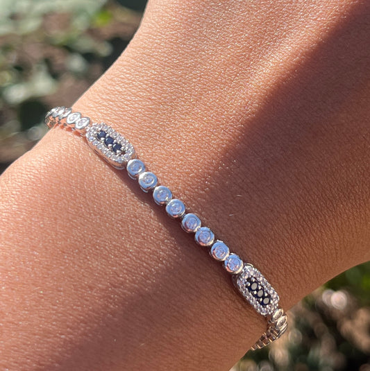 Tennis bracelet with rectangle design and royal blue cz stones