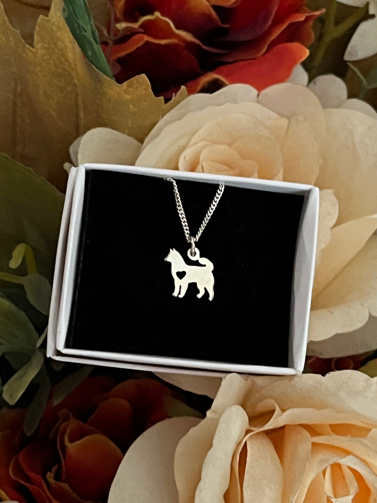 Handmade tiny husky necklace